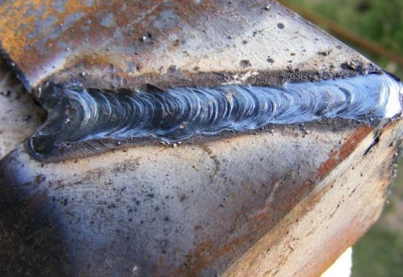 Ultrasonic inspection probe measuring wall thinning from flow-accelerated corrosion in pipe