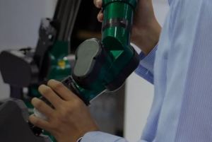 Pull-off adhesion test on coated substrate measuring bond strength with dolly fixture