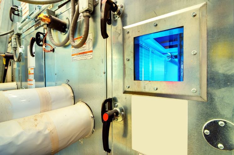 Laboratory technician analyzing disinfection and sterilization efficacy under controlled conditions