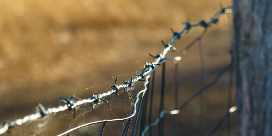 Fatigue testing machine showing high cycle rotating bending specimen under sinusoidal cyclic load