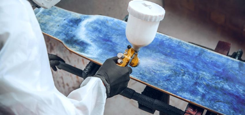 Cross-cut adhesion test on painted surface showing tape pull evaluation per ASTM D3359