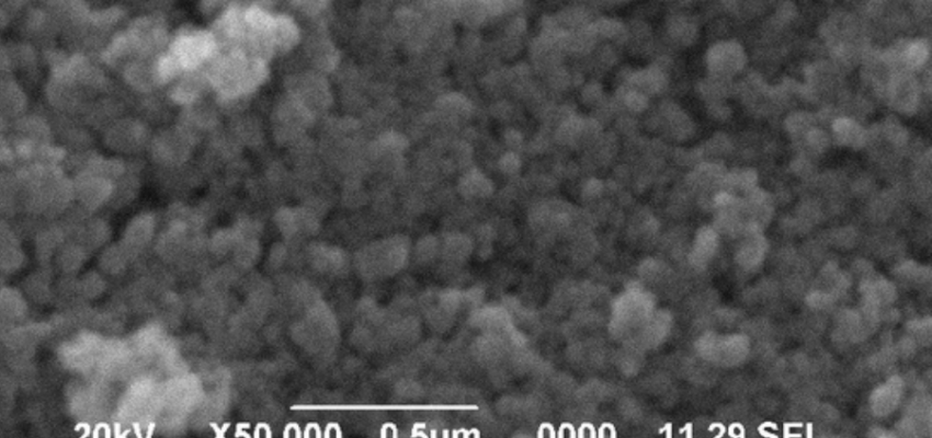SEM secondary electron image showing surface topography of metal alloy at high magnification